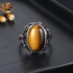 Elegant ring with tiger eye cabochon